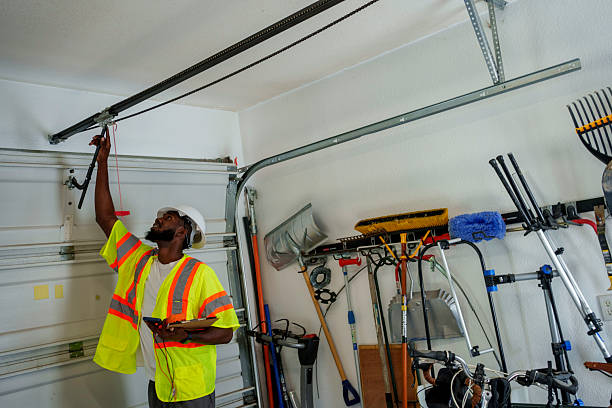 Professional Garage Door Panel Replacement technician working in Belmond, IA